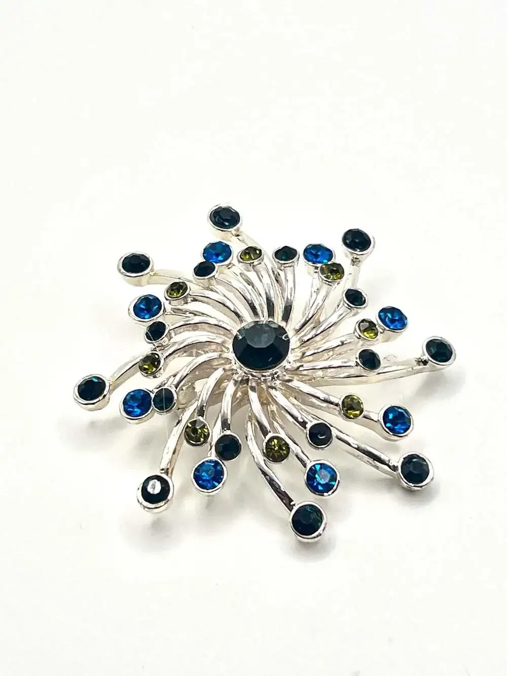 Dana Buchman Silver Tone Blue and Green Rhinestone Swirl Starburst Brooch Pin